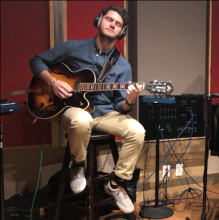 710 sq for web story - Braeden guitar.PNG